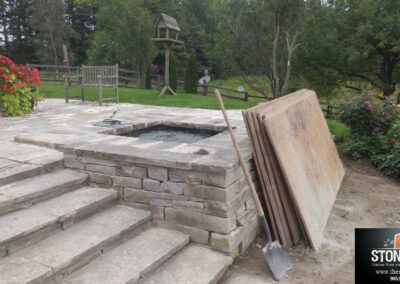 Pond and dry laid stone wall