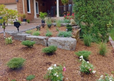 Front garden with armour stone wall